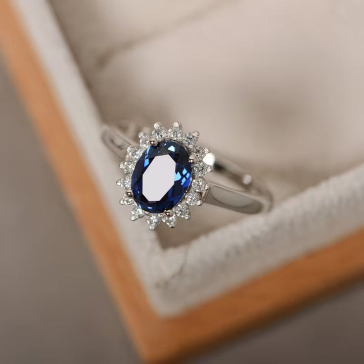 Oval Sapphire Blue Halo Ring