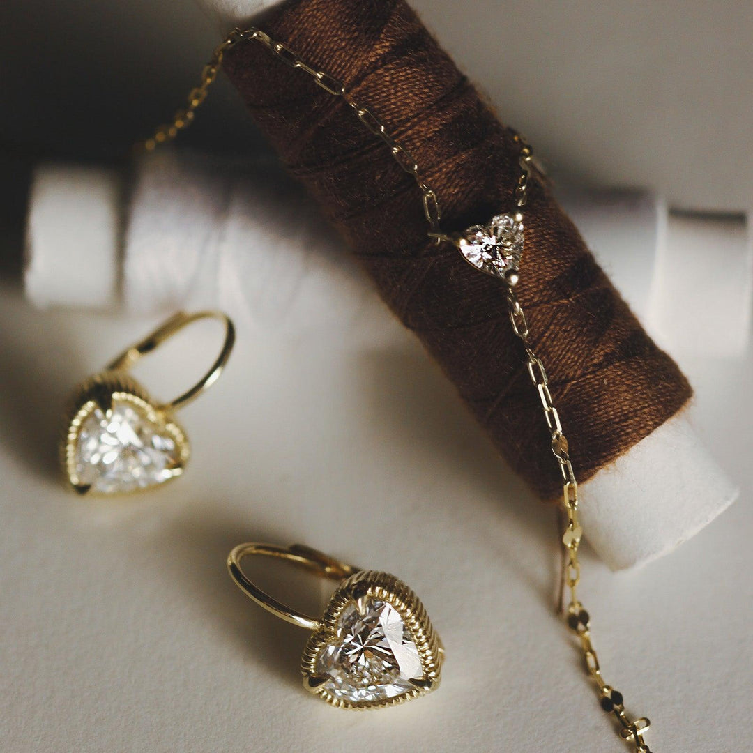 Solis Ribbed Heart Diamond Earrings